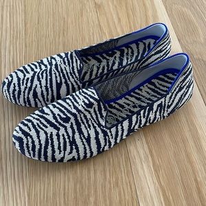 Rothy’s dark navy zebra stripe loafer
